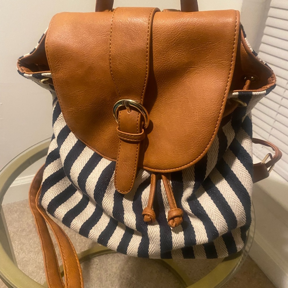 Navy and White stripped Canvas backpack w/brown faux leather